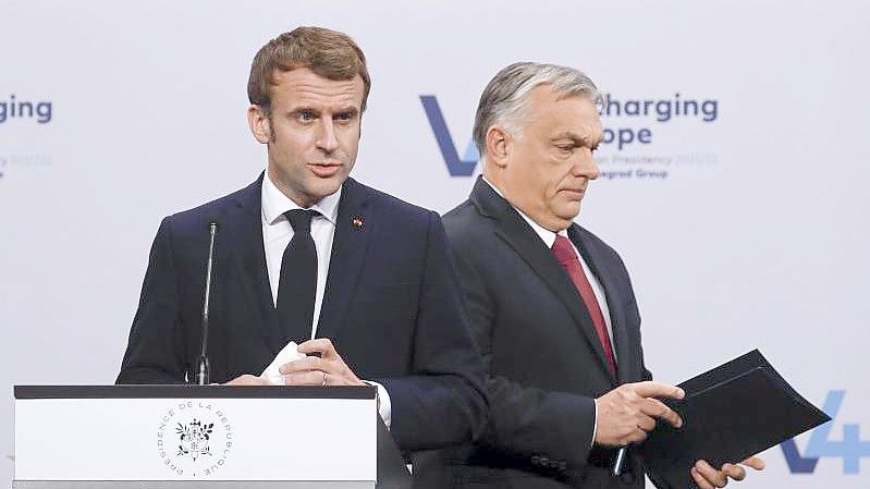 Emmanuel Macron (l) und Viktor Orban in Budapest. Foto: Laszlo Balogh/AP/dpa