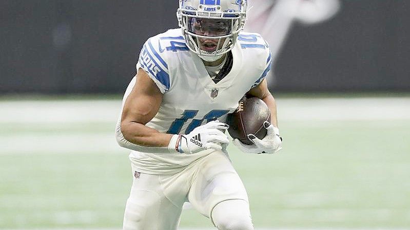 Erzielte in der Partie gegen Seattle Seahawks zwei Touchdowns in einem Spiel:Amon-Ra St. Brown (l) von den Detroit Lions in Aktion. Foto: John Bazemore/AP/dpa