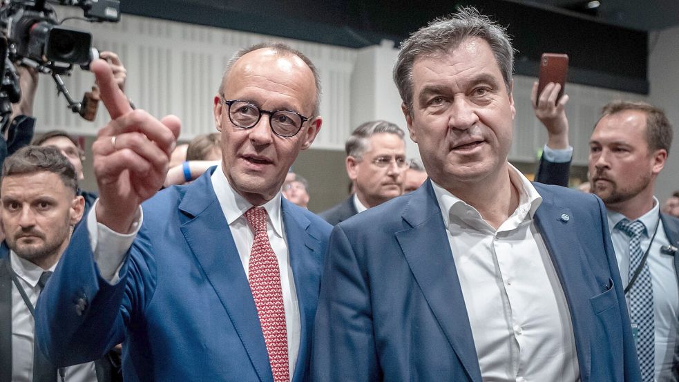 Merz und Söder auf dem CDU-Bundesparteitag. Foto: Michael Kappeler/dpa