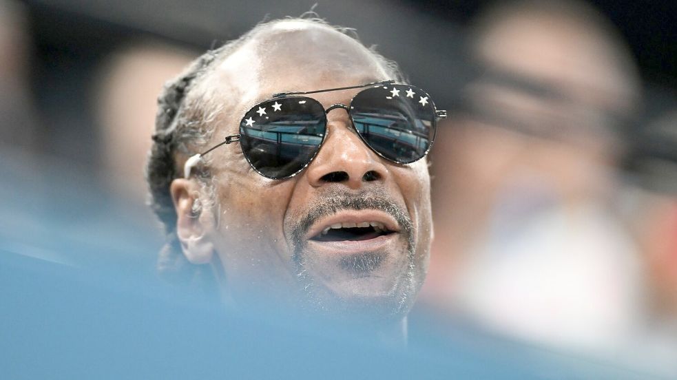 Rapper Snoop Dogg schaute in Paris auch vorbei. Foto: Marijan Murat/dpa