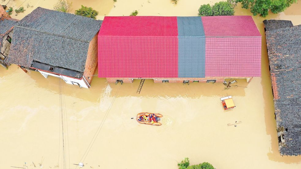 Die Provinz Hunan in China ist besonders von den starken Regenfällen betroffen. Foto: Uncredited/CHINATOPIX/AP/dpa