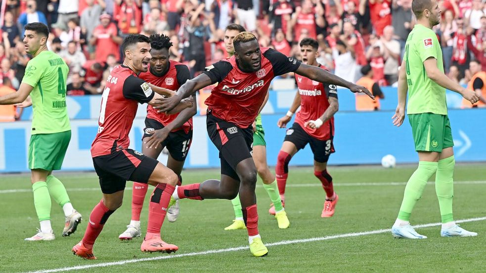 Victor Boniface lässt Bayer mal wieder in der Nachspielzeit jubeln. Foto: Federico Gambarini/dpa