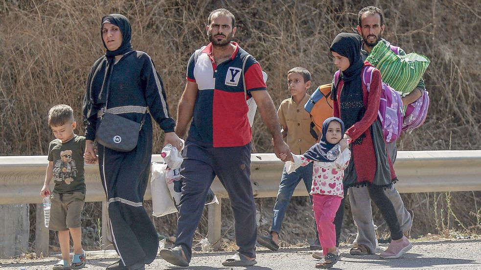 Eine libanesische Familie auf der Flucht. (Archivbild) Foto: Marwan Naamani/dpa