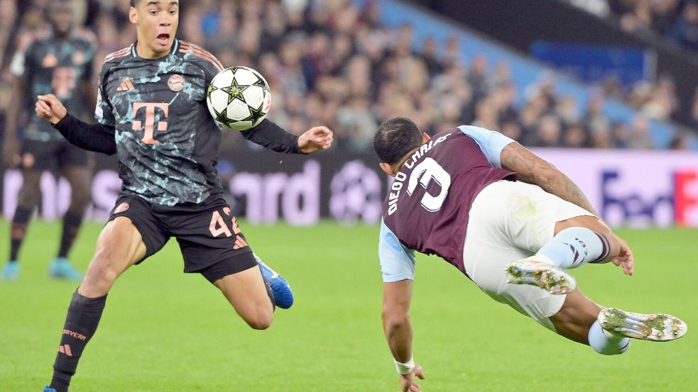 Jamal Musiala (l), hier im Einsatz gegen Aston Villa, muss vorerst pausieren. Foto: Peter Kneffel/dpa