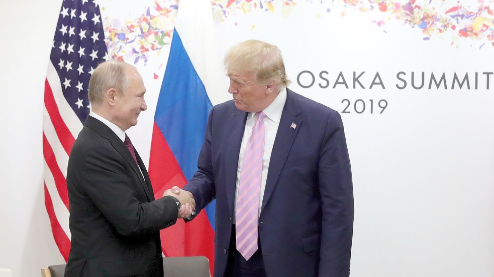 Mögen sich: Wladimir Putin und Donald Trump - hier beim G20-Treffen in Osaka 2019. Foto: dpa/Pool Sputnik Kremlin /AP