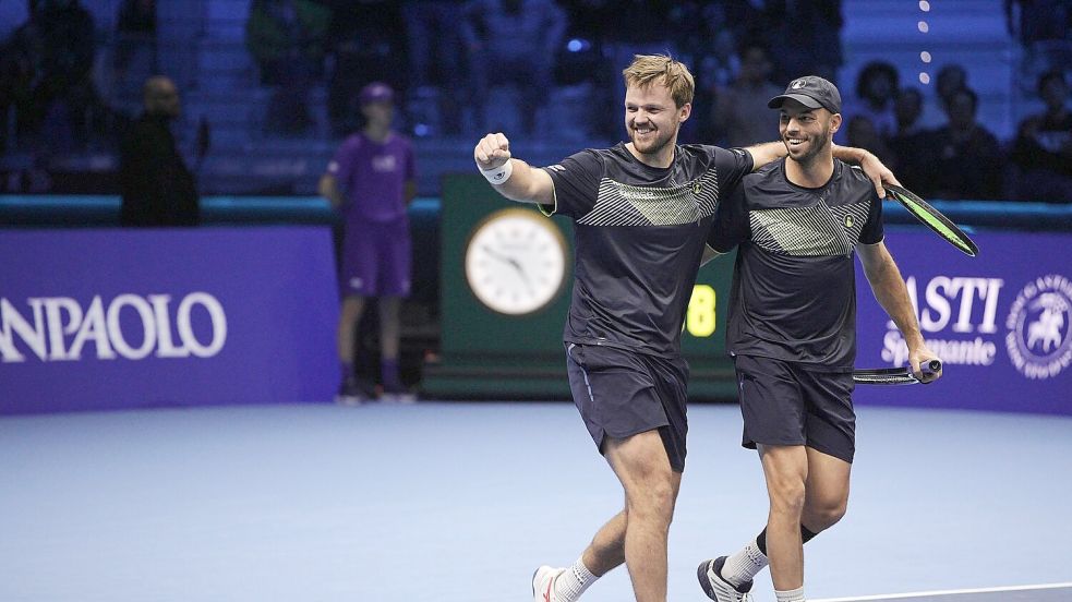 Kevin Krawietz (l) und Tim Pütz (r) gelang ein Stück deutsche Tennis-Geschichte. Foto: Marco Alpozzi/LaPresse via ZUMA Press/dpa