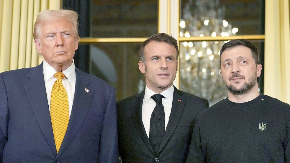 Trump hatte einen Besuch in Paris auch für ein Treffen mit dem französischen und dem ukrainischen Präsidenten genutzt. Foto: Aurelien Morissard/AP/dpa