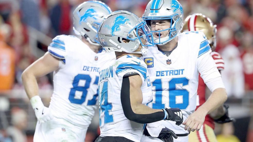 Die Detroit Lions um Quarterback Jared Goff (r.) und Wide Receiver Amon-Ra St. Brown spielen die beste Saison ihrer Geschichte. Foto: Jed Jacobsohn/AP/dpa