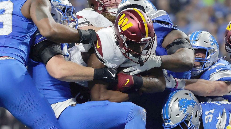 Brian Robinson und die Washington Commanders fanden fast immer einen Weg durch die Abwehr der Lions. Foto: Rey Del Rio/AP/dpa