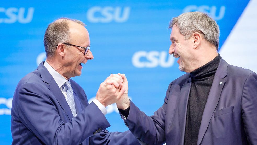 Die Chefs von CSU und CDU, Markus Söder und Friedrich Merz, setzen auf Geschlossenheit im Wahlkampf. Foto: Daniel Karmann/dpa