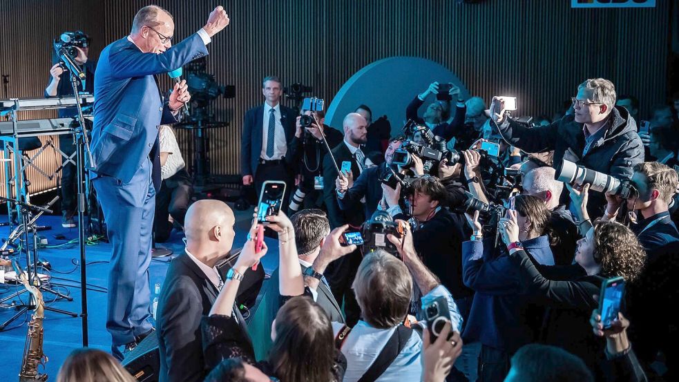 So sehen Sieger aus: Merz am Wahlabend. Foto: Christoph Soeder/dpa