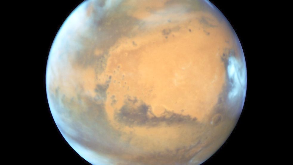 Der rötliche Planet Mars, wie er auf einem Bild des „Hubble“-Weltraumteleskops zu sehen ist. (Archivbild) Foto: -/EPA/NASA /HUBBLE/dpa